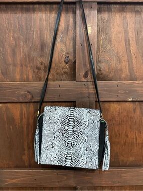Black and White Snake-Print Crossbody Bag with Tassel Accents